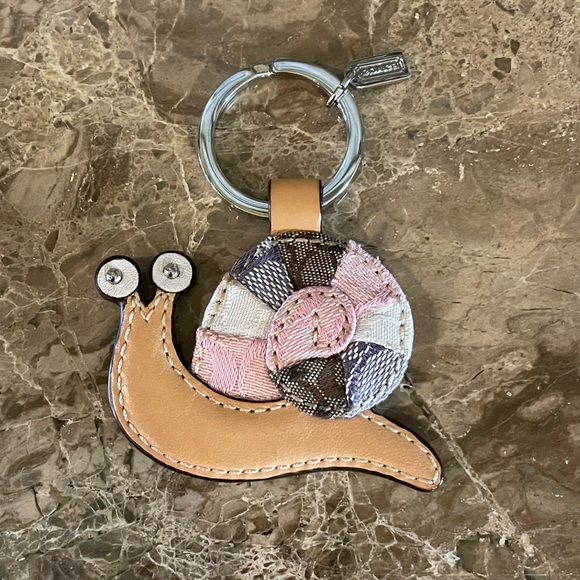 Coach Accessories - COACH Snail Pink Patchwork And Leather Keychain Bag Charm